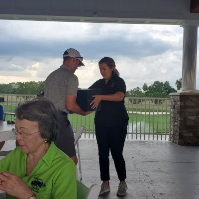 Golfer accepting award